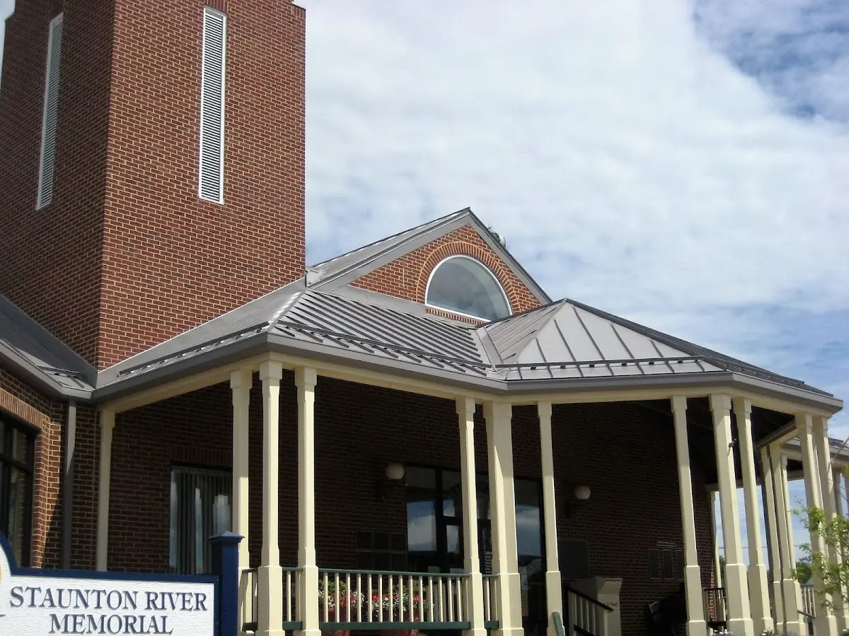 Skilled roofing craftsmen working on a residential roof in Valparaiso